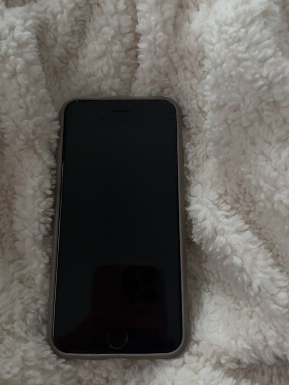 Apple iPhone with Black Display and Gray Case